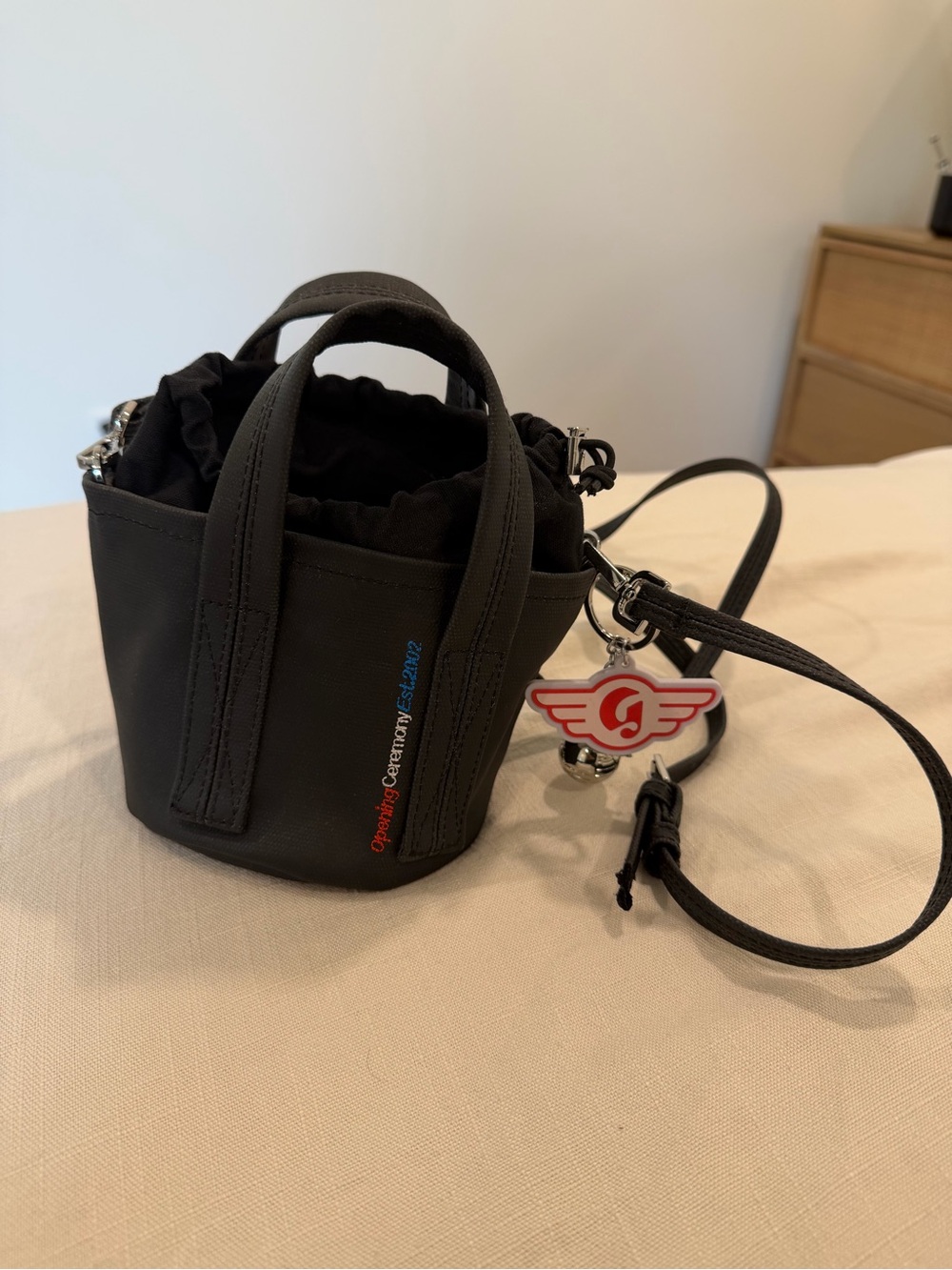Black Mini Bucket Crossbody Bag with Key Charm